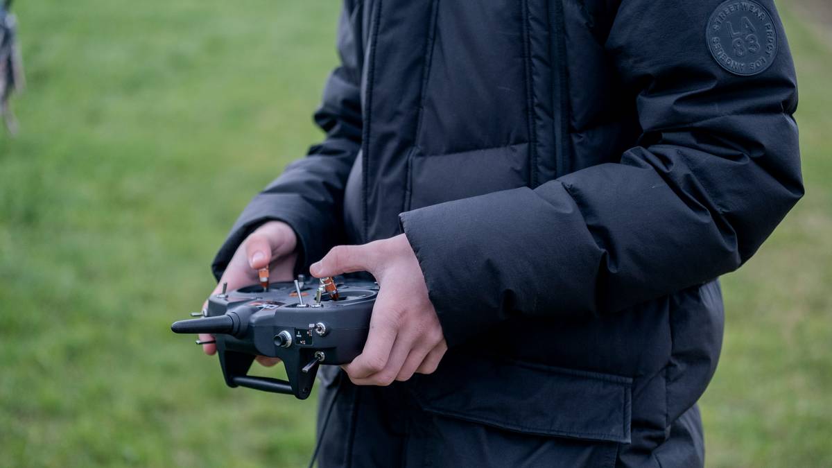 Close-up of rc car radio system with transmitter and receiver showing antenna alignment